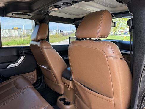 Used 2013 Jeep Wrangler Unlimited Sahara w/ Dual Top Group AWD/4WD image 22