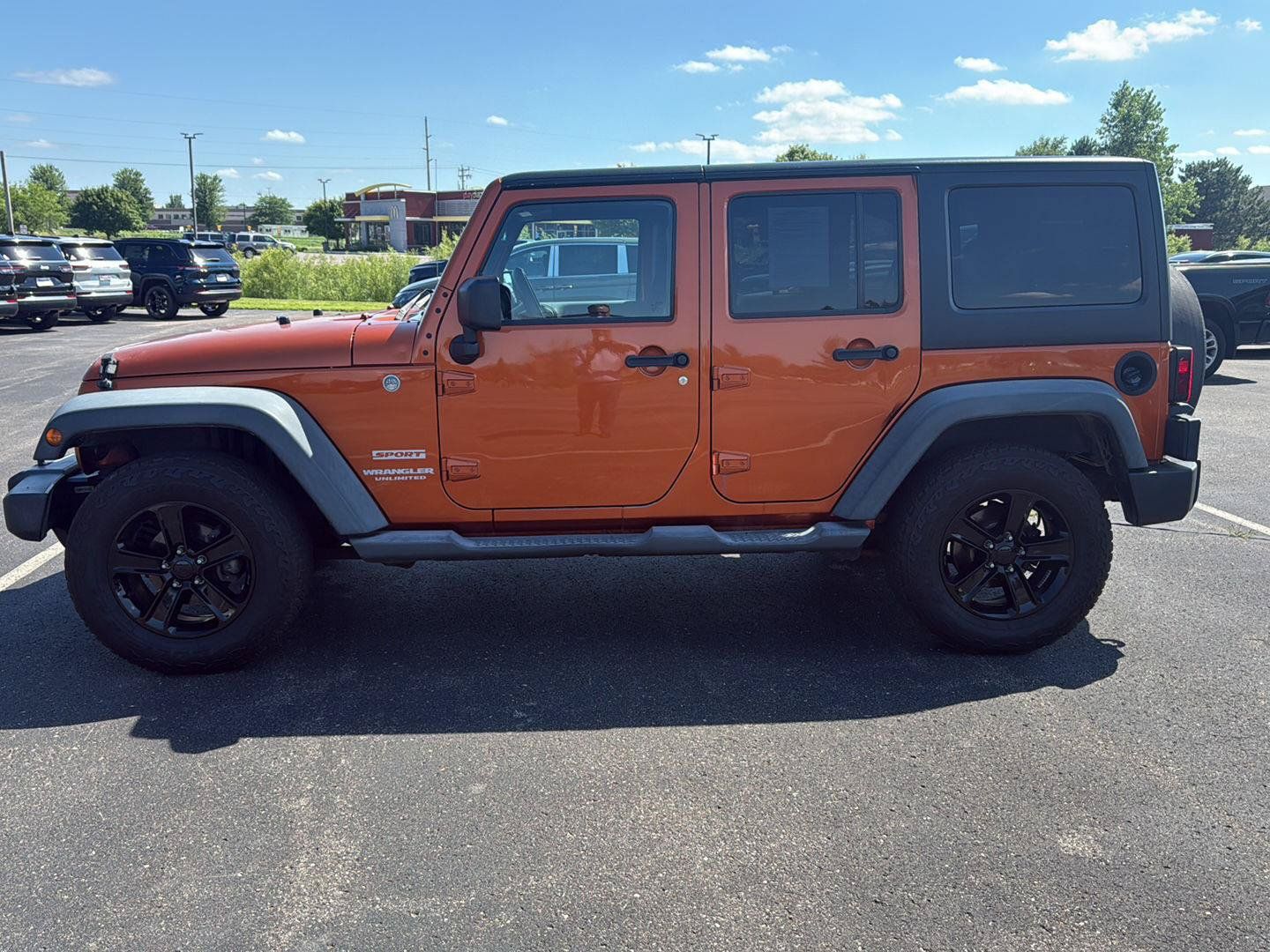 Used 2011 Jeep Wrangler Unlimited Sport AWD/4WD image 2