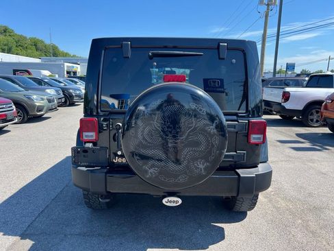 Used 2014 Jeep Wrangler Unlimited Sahara AWD/4WD image 4