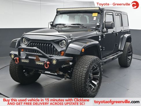Used 2012 Jeep Wrangler Unlimited Sahara w/ Dual Top Group image 1