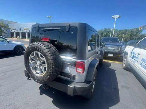 Used 2014 Jeep Wrangler Unlimited Rubicon w/ Dual Top Group AWD/4WD image 7