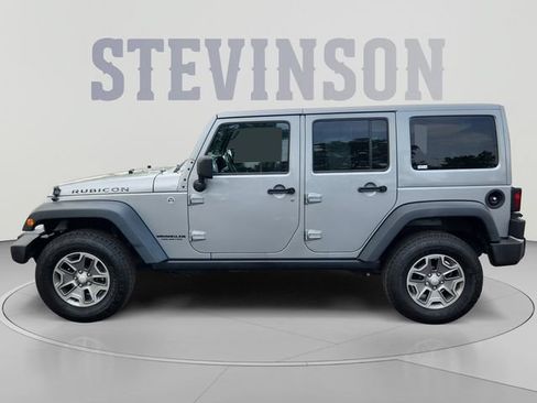 Used 2014 Jeep Wrangler Unlimited Rubicon w/ Connectivity Group AWD/4WD image 2