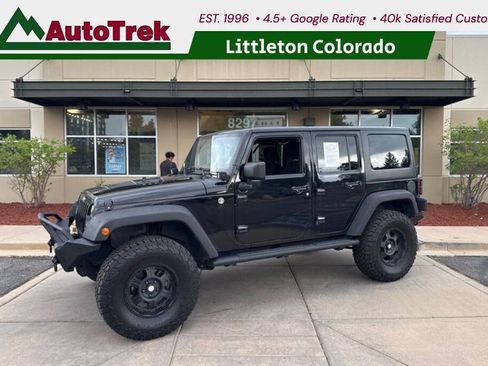 Used 2013 Jeep Wrangler Unlimited Sport AWD/4WD image 1