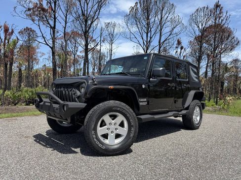 Used 2012 Jeep Wrangler Unlimited Sport w/ Connectivity Group AWD/4WD image 1
