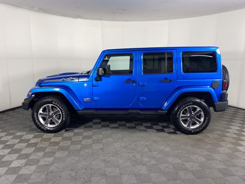 Used 2014 Jeep Wrangler Unlimited Sahara AWD/4WD image 9