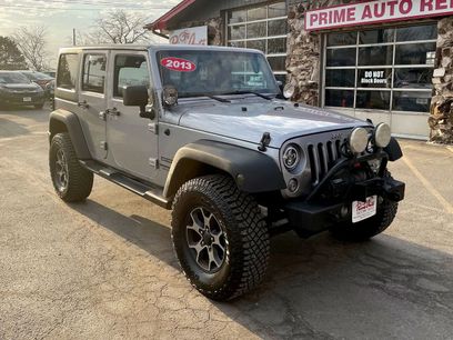Used 2013 Jeep Wrangler Unlimited Sport w/ Dual Top Group