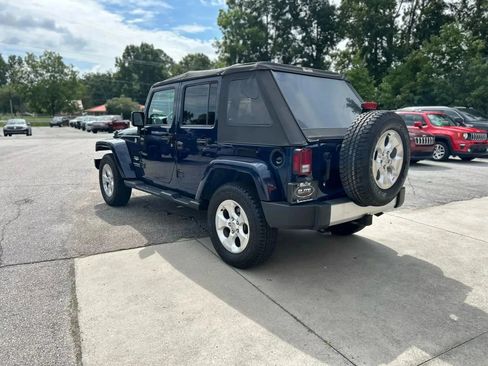 Used 2013 Jeep Wrangler Unlimited Sahara w/ Dual Top Group image 9