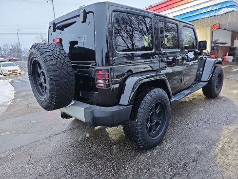 Used 2014 Jeep Wrangler Unlimited Sahara w/ Dual Top Group image 12