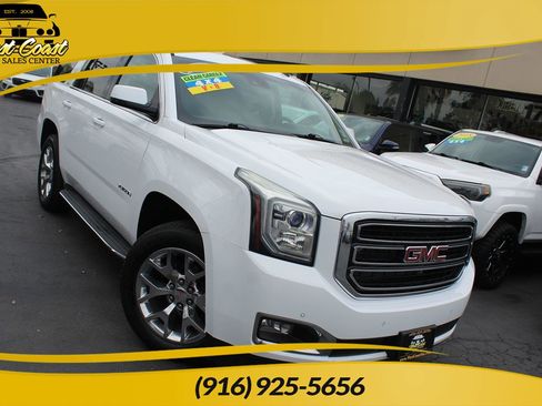 Used 2015 GMC Yukon SLT w/ Open Road Package image 1