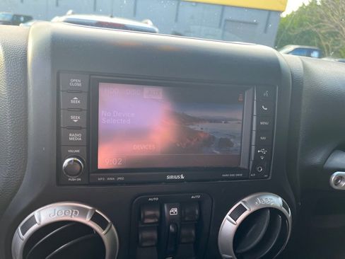 Used 2013 Jeep Wrangler Unlimited Sahara w/ Dual Top Group image 10