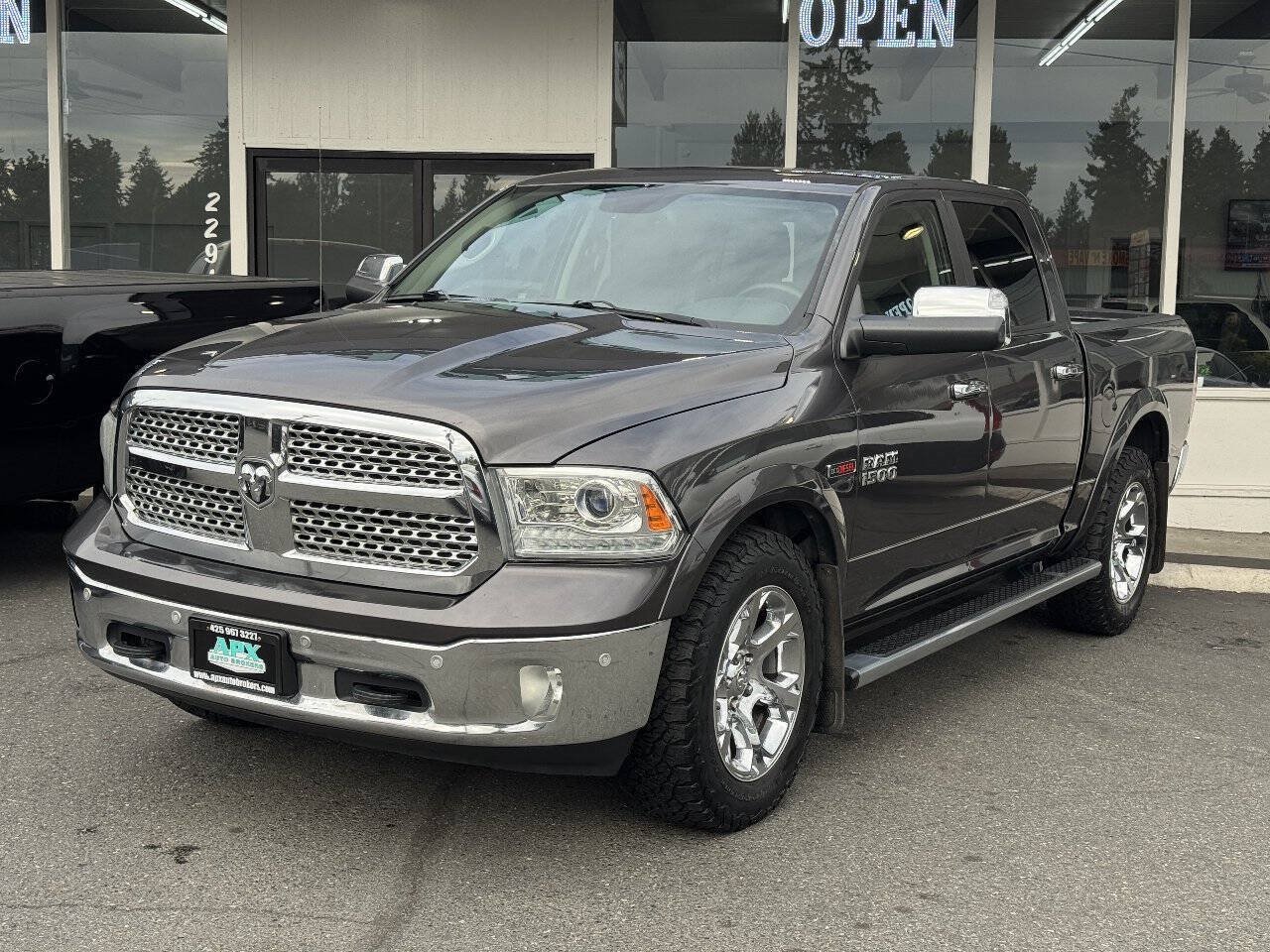 Used 2015 RAM 1500 Laramie AWD/4WD image 1