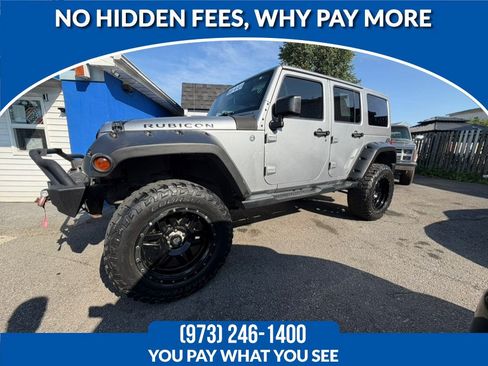 Used 2015 Jeep Wrangler Unlimited Rubicon w/ Connectivity Group AWD/4WD image 1