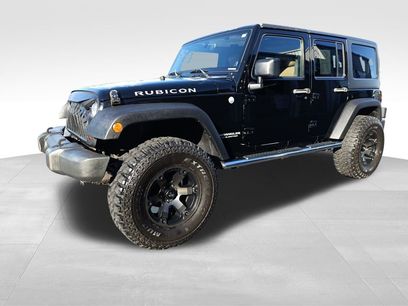 Used 2011 Jeep Wrangler Unlimited Rubicon w/ Dual Top Group