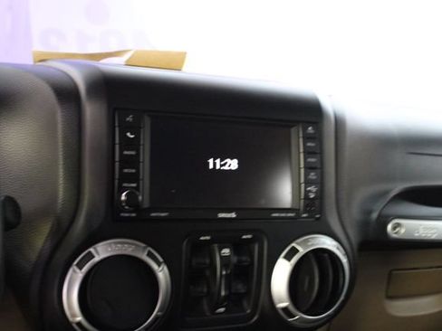 Used 2014 Jeep Wrangler Unlimited Sahara w/ Dual Top Group AWD/4WD image 16