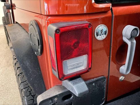 Used 2014 Jeep Wrangler Unlimited Sahara w/ Dual Top Group AWD/4WD image 24