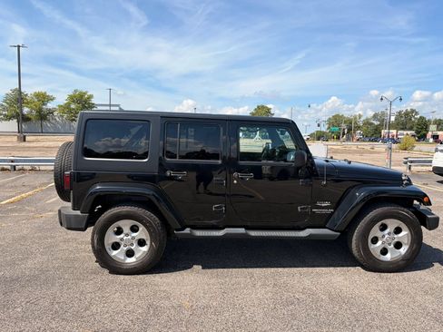 Used 2014 Jeep Wrangler Unlimited Sahara w/ Dual Top Group AWD/4WD image 7