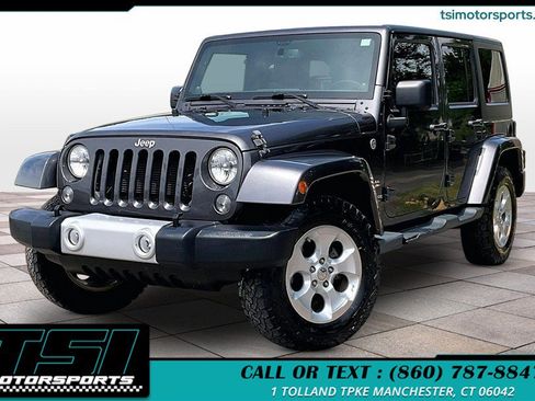 Used 2014 Jeep Wrangler Unlimited Sahara w/ Connectivity Group AWD/4WD image 1
