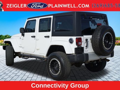 Used 2012 Jeep Wrangler Unlimited Sahara w/ Dual Top Group AWD/4WD image 3