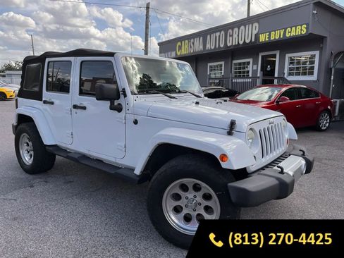 Used 2013 Jeep Wrangler Unlimited Sahara w/ Connectivity Group AWD/4WD image 1