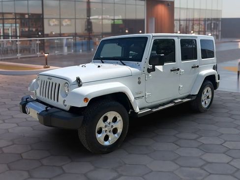 Used 2015 Jeep Wrangler Unlimited Sahara w/ Mopar Chrome Edition Group AWD/4WD image 2