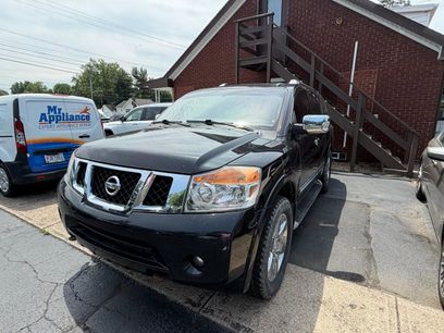 Used 2014 Nissan Armada Platinum w/ 2nd Row Captain Seat Package