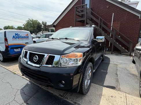 Used 2014 Nissan Armada Platinum w/ 2nd Row Captain Seat Package AWD/4WD image 1