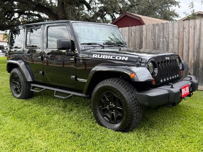 Used 2013 Jeep Wrangler Unlimited Rubicon w/ Dual Top Group