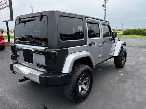 Used 2014 Jeep Wrangler Unlimited Sahara w/ Dual Top Group AWD/4WD image 6