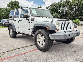 Used 2013 Jeep Wrangler Unlimited Sport AWD/4WD video 1