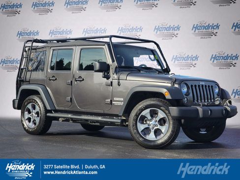 Used 2016 Jeep Wrangler Unlimited Sport image 1