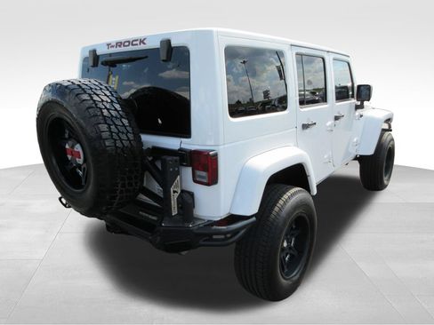 Used 2014 Jeep Wrangler Unlimited Sahara w/ Dual Top Group AWD/4WD image 5