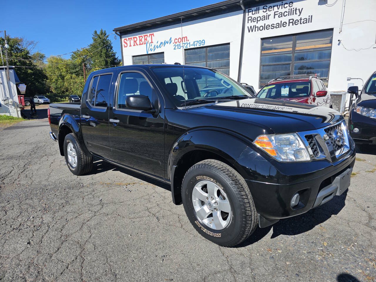 Used 2012 Nissan Frontier SV w/ SV Premium Utility Pkg AWD/4WD image 1