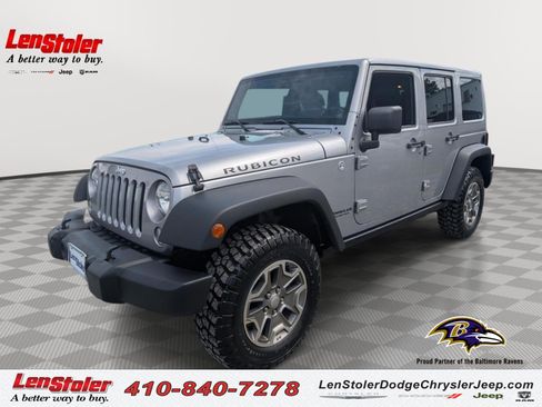 Used 2014 Jeep Wrangler Unlimited Rubicon w/ Dual Top Group AWD/4WD image 1
