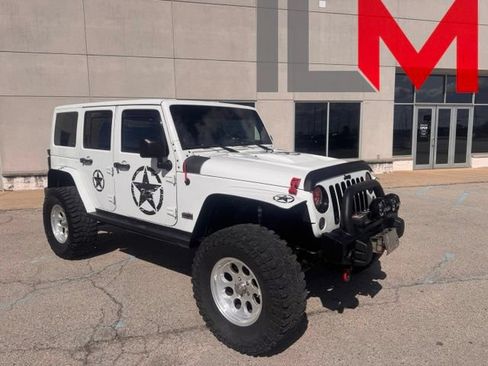 Used 2014 Jeep Wrangler Unlimited Sahara AWD/4WD image 1