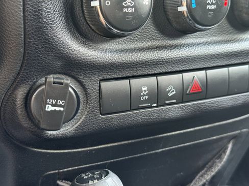 Used 2013 Jeep Wrangler Unlimited Sport w/ Mopar Black Appearance Group image 24