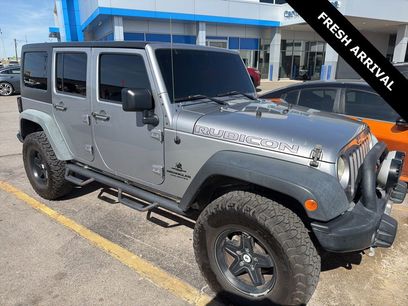Used 2014 Jeep Wrangler Unlimited Rubicon w/ Dual Top Group