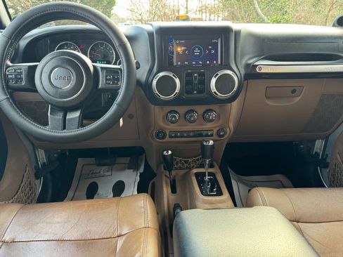 Used 2012 Jeep Wrangler Unlimited Sahara w/ Dual Top Group AWD/4WD image 5