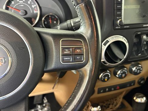 Used 2013 Jeep Wrangler Unlimited Sahara w/ Mopar Chrome Edition Group AWD/4WD image 25