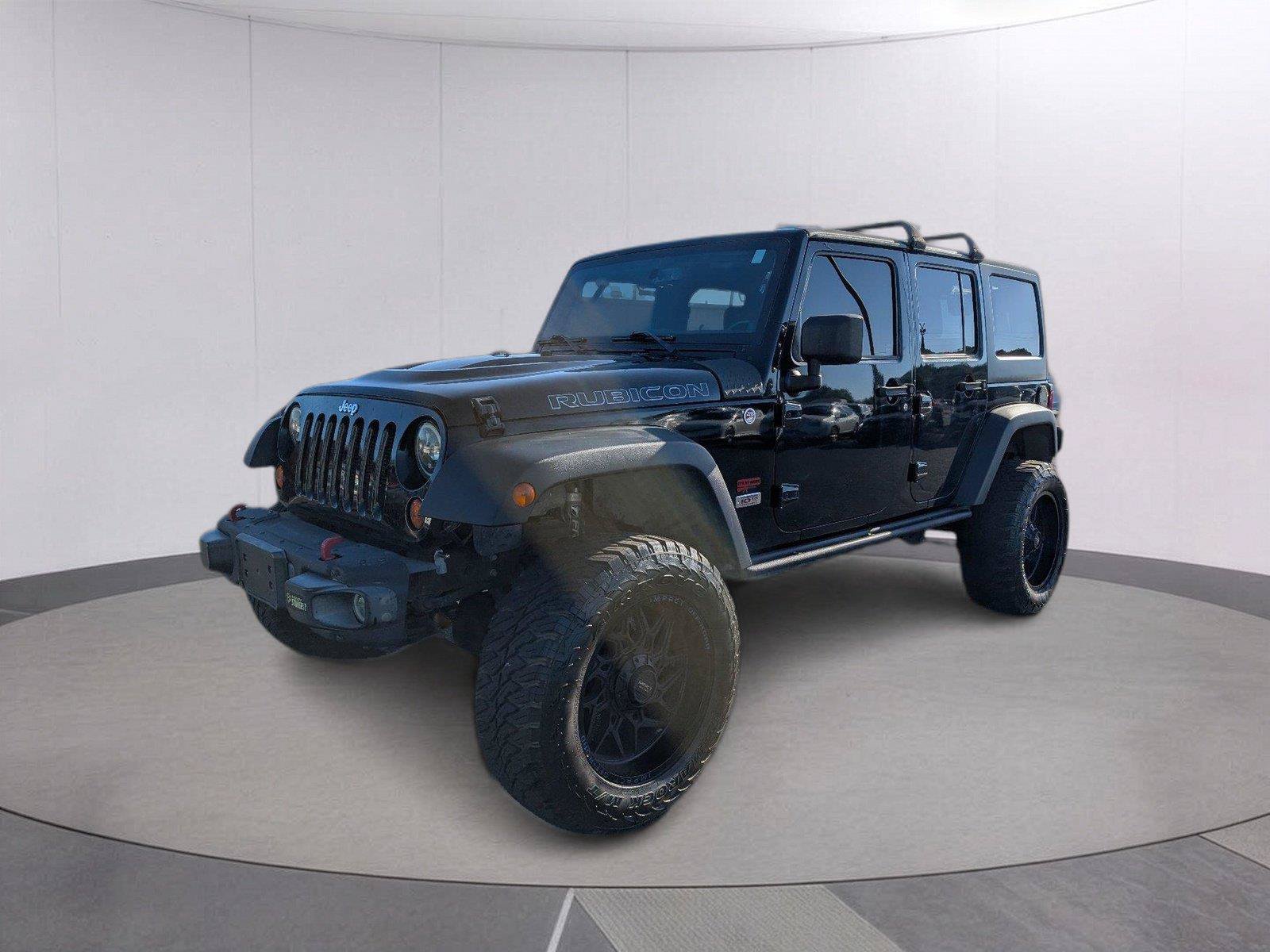 Used 2013 Jeep Wrangler Unlimited Rubicon AWD/4WD image 1