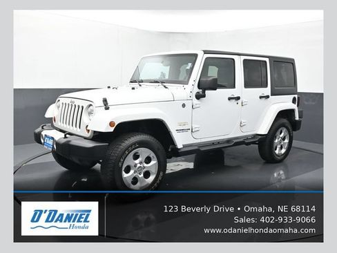 Used 2013 Jeep Wrangler Unlimited Sahara w/ Trailer Tow Group AWD/4WD image 1