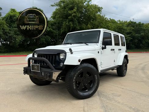Used 2015 Jeep Wrangler Unlimited Sahara AWD/4WD image 1