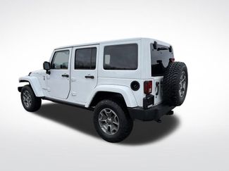 Used 2014 Jeep Wrangler Unlimited Rubicon w/ Max Tow Package video 3