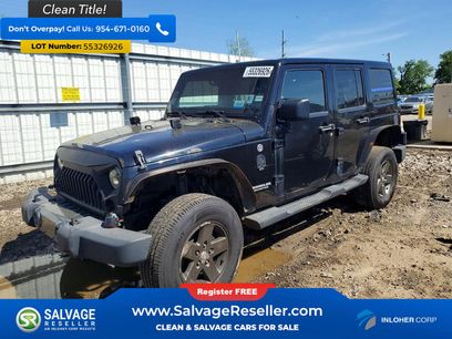Used 2011 Jeep Wrangler Unlimited Sport w/ Dual Top Group