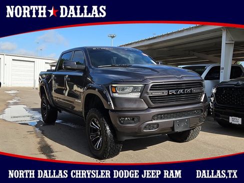 Used 2024 RAM 1500 Laramie AWD/4WD image 1