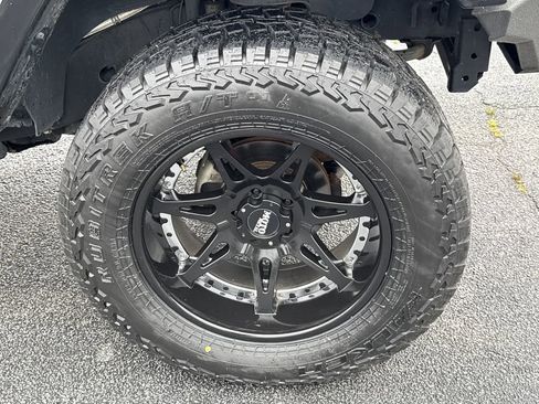 Used 2015 Jeep Wrangler Unlimited Sahara w/ Dual Top Group AWD/4WD image 12