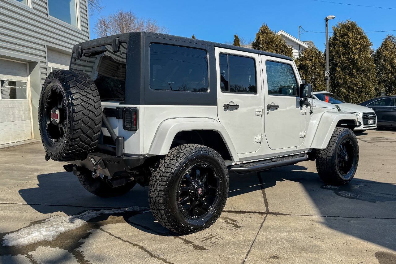 Used 2014 Jeep Wrangler Unlimited Sahara w/ Dual Top Group AWD/4WD image 4