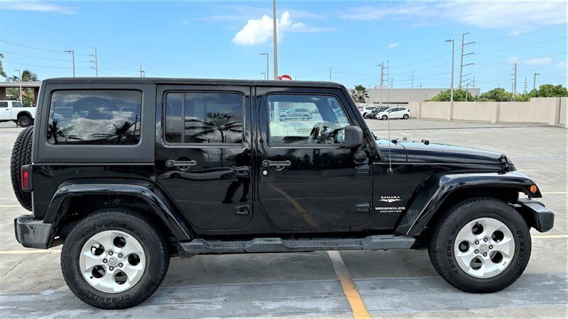 Used 2013 Jeep Wrangler Unlimited Sahara AWD/4WD image 7