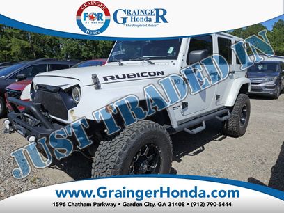 Used 2013 Jeep Wrangler Unlimited Rubicon w/ Dual Top Group