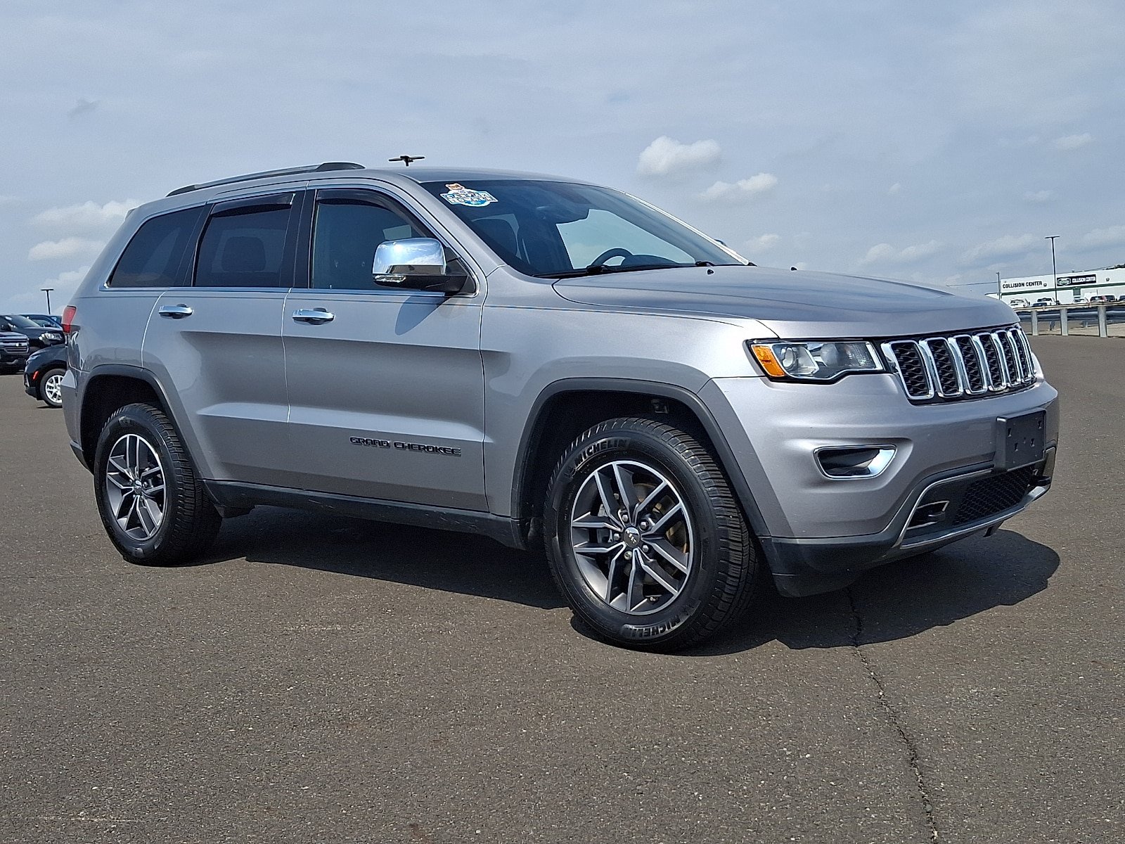 Used 2017 Jeep Grand Cherokee Limited AWD/4WD image 1