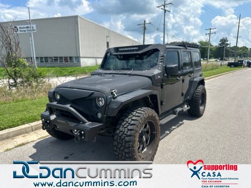 Used 2017 Jeep Wrangler Unlimited Sahara w/ Dual Top Group AWD/4WD image 1